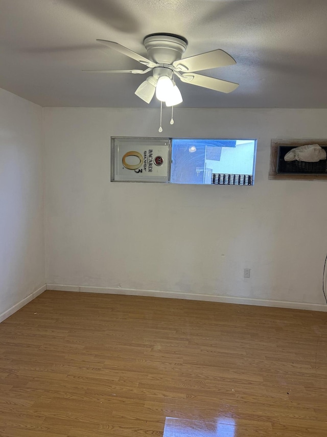18B Gurule Rd, Peralta, NM 87042 - empty room with wood finished floors, ceiling fan, and baseboards