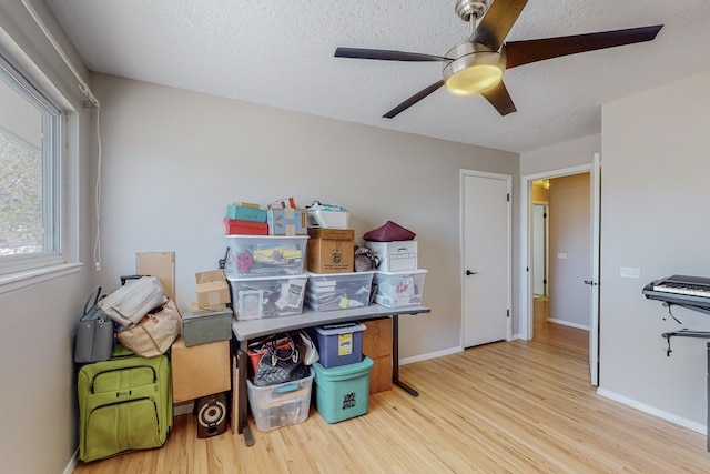 storage room featuring ceiling fan