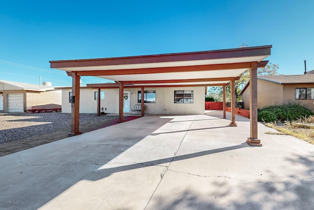 exterior space with a carport