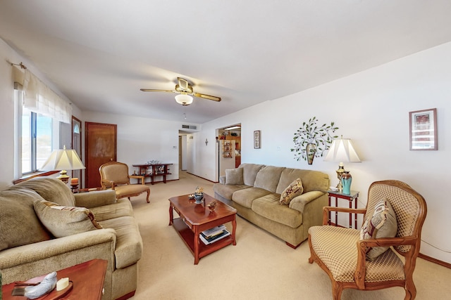 living room with carpet and ceiling fan