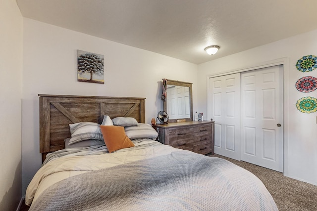 bedroom featuring a closet and carpet