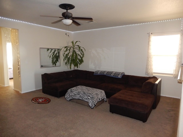 living room with carpet and ceiling fan