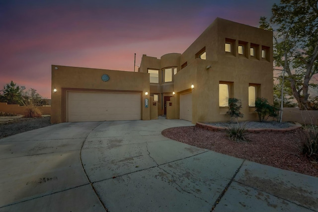 adobe home with a garage