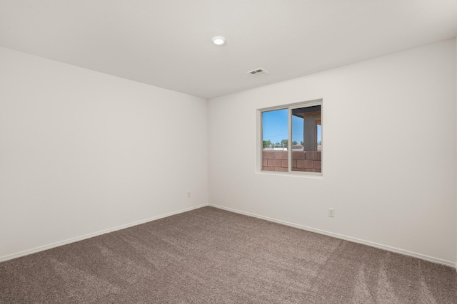 view of carpeted spare room