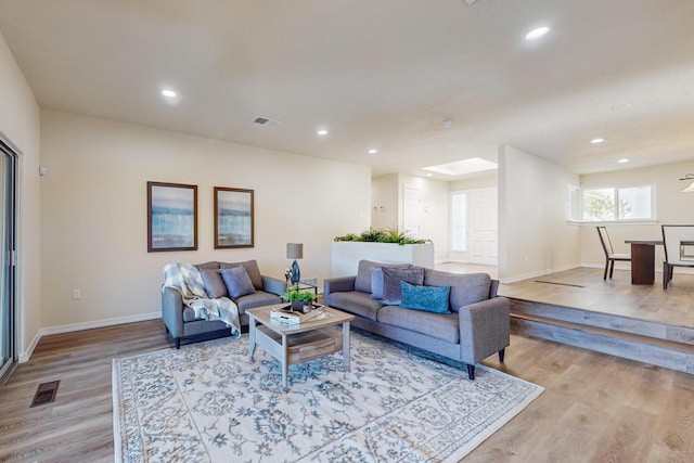 living room featuring light wood-type flooring