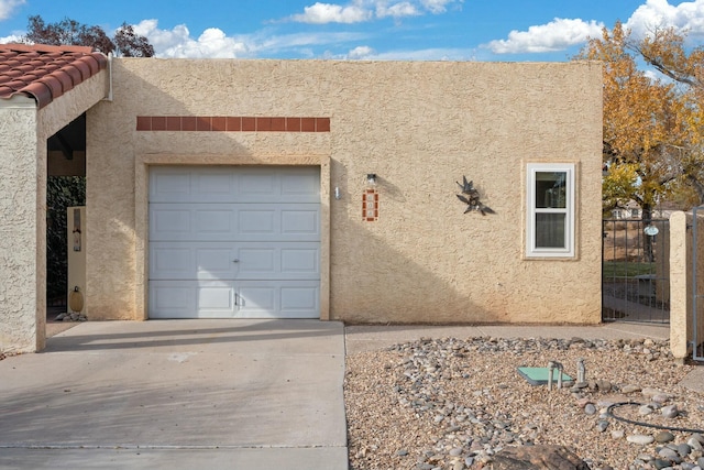 exterior space with a garage