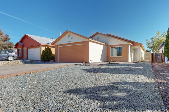 single story home featuring a garage