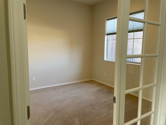 view of carpeted spare room