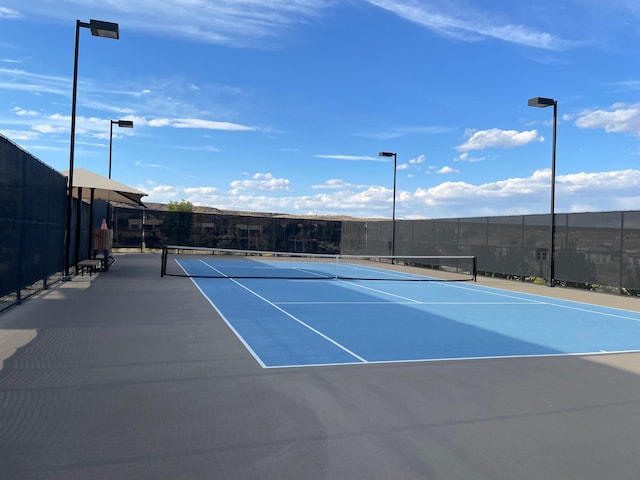 view of tennis court with basketball court