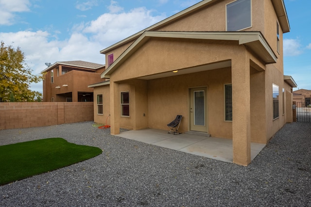 back of house featuring a patio