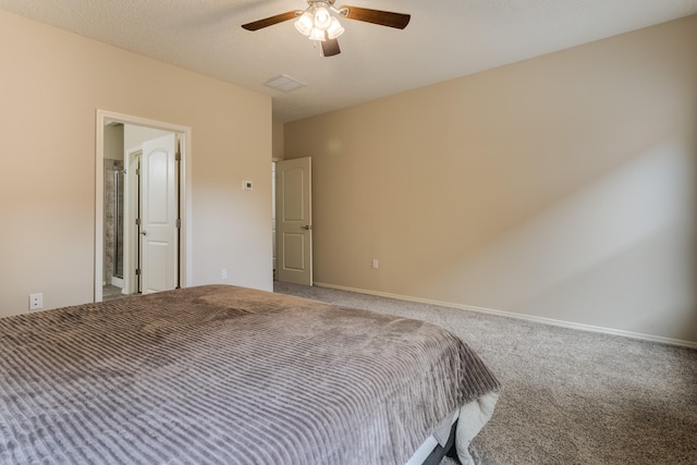 unfurnished bedroom with carpet flooring, a textured ceiling, and ceiling fan