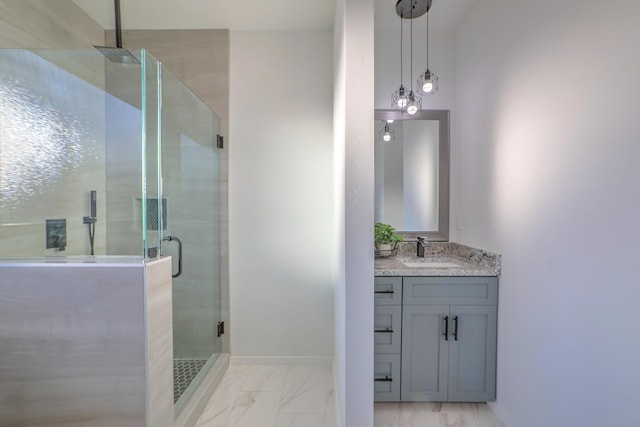 1109 11th St SE, Rio Rancho, NM 87124 - full bathroom featuring marble finish floor, baseboards, a stall shower, and vanity