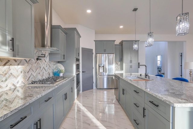 1109 11th St SE, Rio Rancho, NM 87124 - kitchen featuring gray cabinetry, marble finish floor, a sink, appliances with stainless steel finishes, and wall chimney exhaust hood