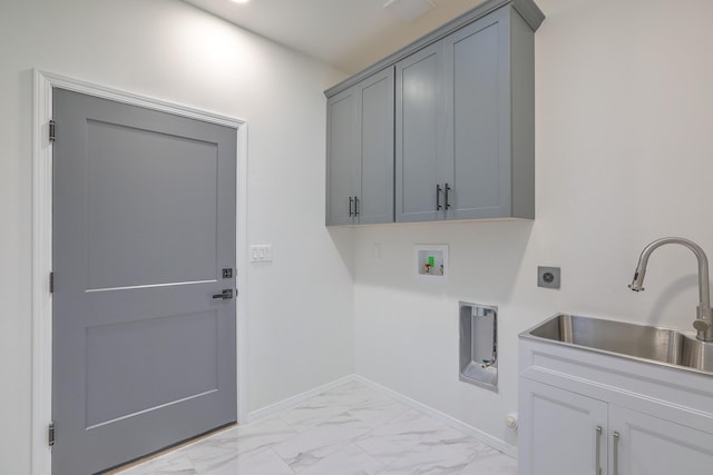 laundry area with electric dryer hookup, cabinets, sink, and hookup for a washing machine