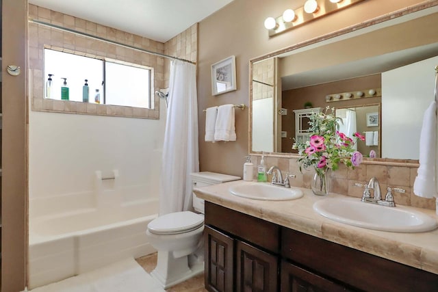 full bathroom featuring tasteful backsplash, vanity, shower / tub combo with curtain, tile patterned flooring, and toilet