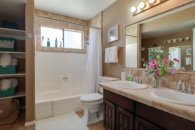 full bathroom featuring tasteful backsplash, tile patterned floors, toilet, shower / bath combo with shower curtain, and vanity