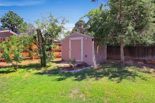 view of outdoor structure featuring a lawn