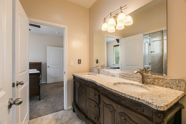 170 Esperanza Dr, Bosque Farms, NM 87068 - full bath featuring a shower, double vanity, a sink, and baseboards