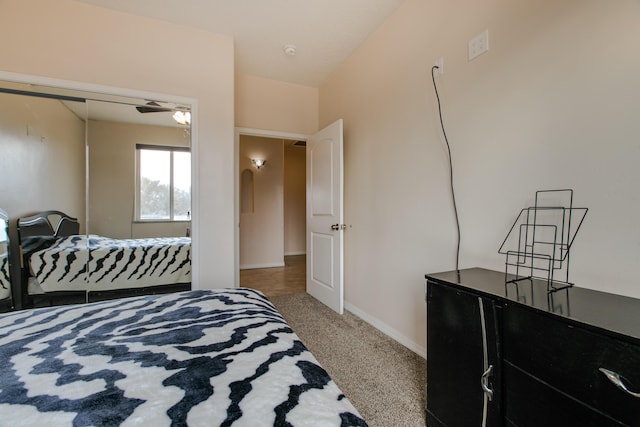 bedroom featuring carpet flooring and a closet