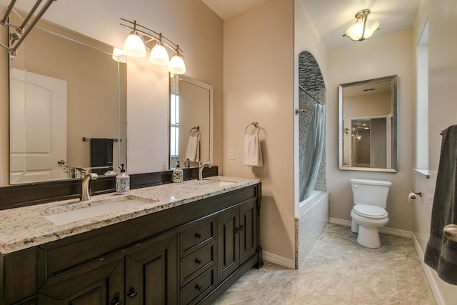 170 Esperanza Dr, Bosque Farms, NM 87068 - bathroom featuring double vanity, shower / bathtub combination with curtain, a sink, and toilet