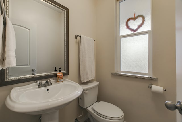 170 Esperanza Dr, Bosque Farms, NM 87068 - half bathroom with a sink and toilet