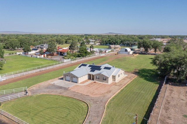 birds eye view of property featuring a rural view