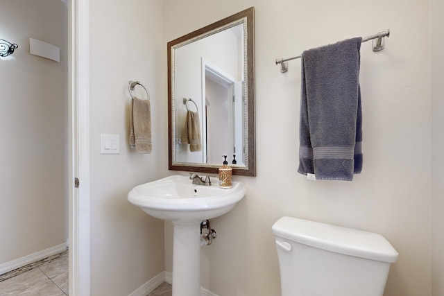 170 Esperanza Dr, Bosque Farms, NM 87068 - bathroom featuring toilet and baseboards
