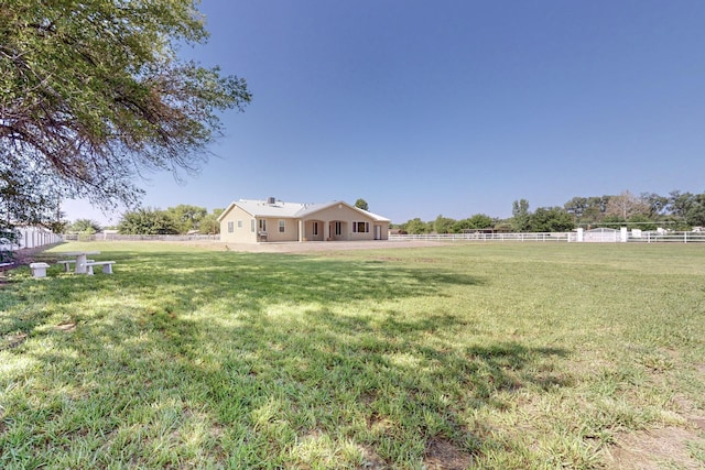 170 Esperanza Dr, Bosque Farms, NM 87068 - view of yard featuring fence, a rural view, and a patio area