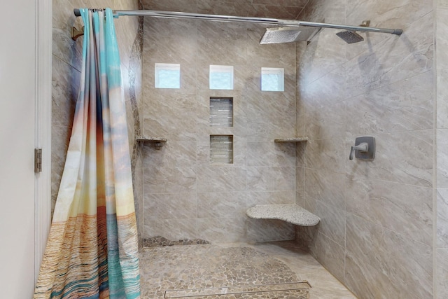 bathroom with curtained shower