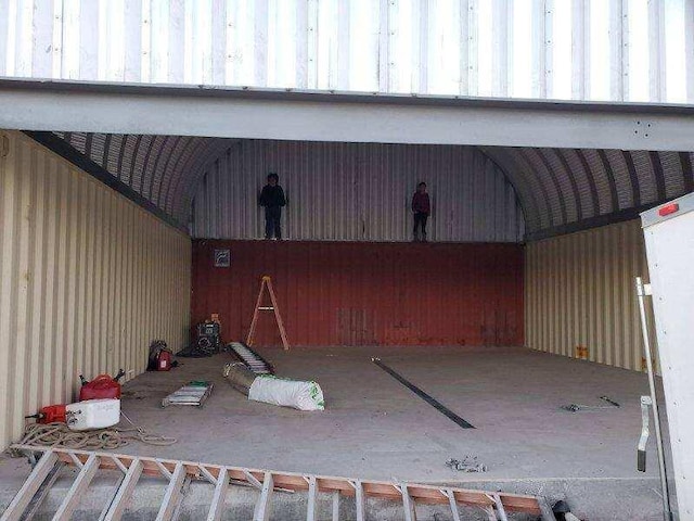 garage with a carport