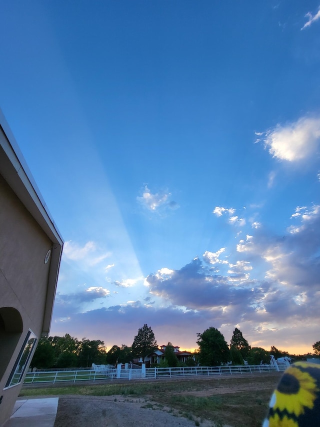 view of yard at dusk