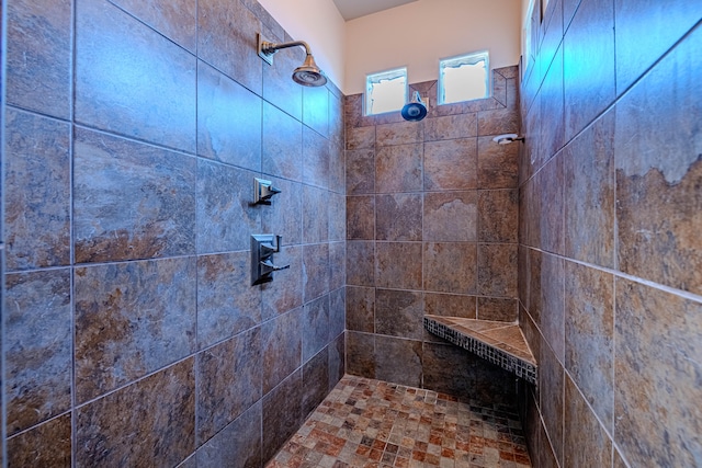 bathroom featuring tiled shower