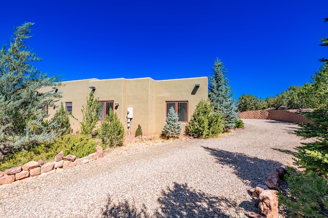 view of adobe home