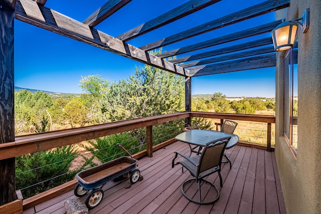 wooden terrace featuring a pergola