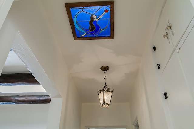 interior details with an inviting chandelier