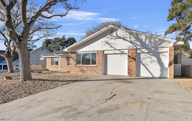 single story home featuring a garage