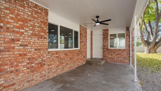 view of patio with ceiling fan