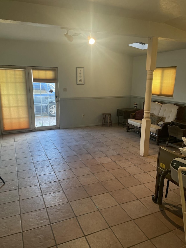 living room with light tile patterned flooring