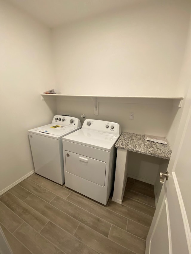 washroom with washer and dryer