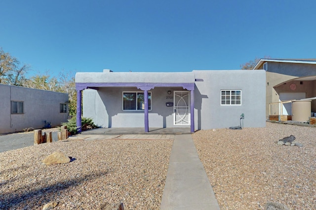 view of adobe home