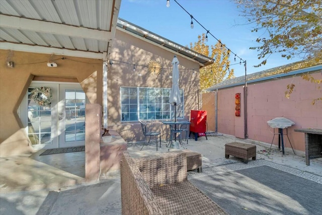 view of patio featuring french doors