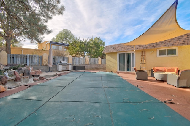 view of swimming pool featuring cooling unit, a patio area, fence, and an outdoor hangout area