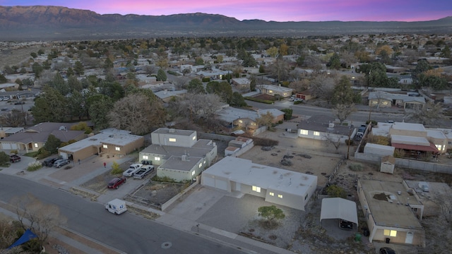 aerial view at dusk with a mountain view