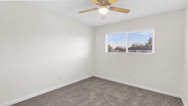 empty room with carpet flooring and ceiling fan