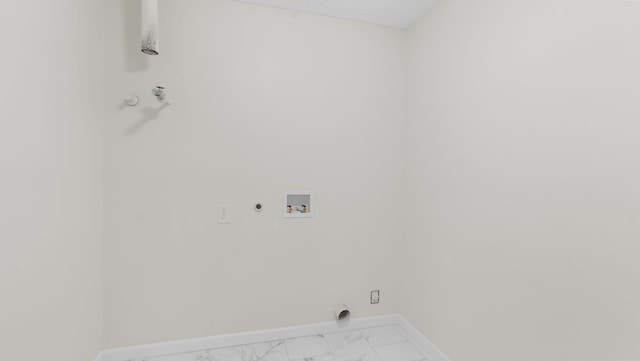 clothes washing area featuring hookup for an electric dryer, washer hookup, and gas dryer hookup