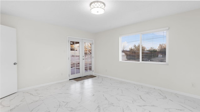 spare room with french doors