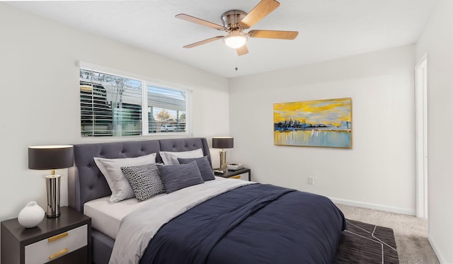 carpeted bedroom featuring ceiling fan