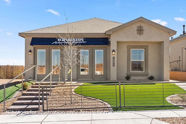 view of front of property featuring a front yard and french doors