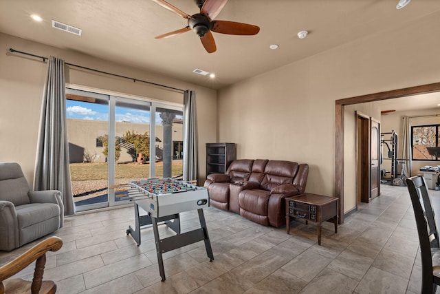 living room with ceiling fan