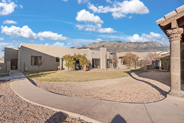 exterior space with a mountain view